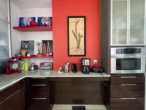 Built in Microwave, coffee maker, French press, toaster oven, Kitchen Aid mixer 