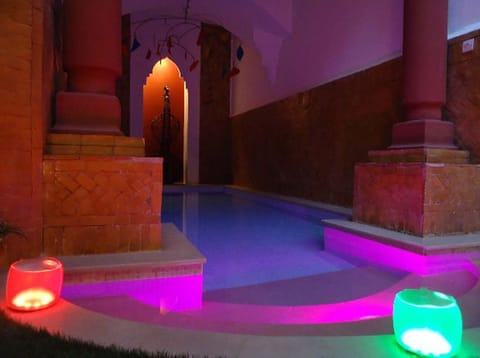 Secluded, serene courtyard splash pool  with architectural details