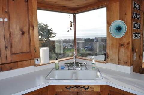 Kitchen sink, looks over ocean