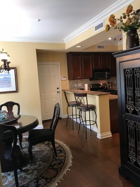 Dining area provides plenty of seating for your group; 6 at table, 3 barstools. 