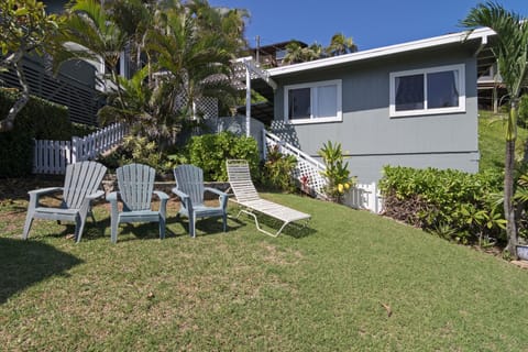 Fenced in yard for lounging or children's play area.