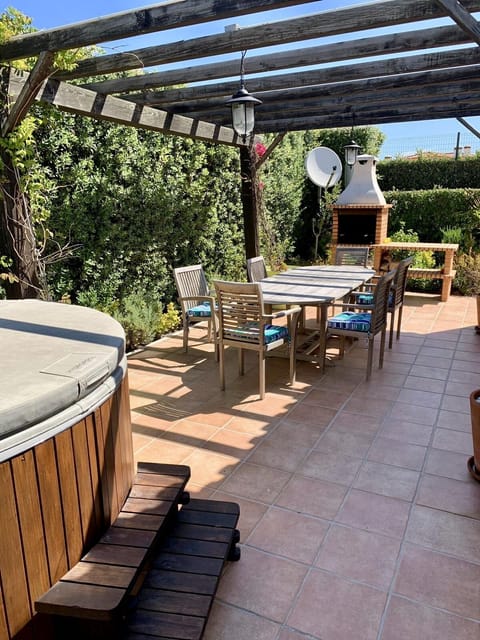 2ND PATIO AREA BY THE JACUZZI AND BBQ