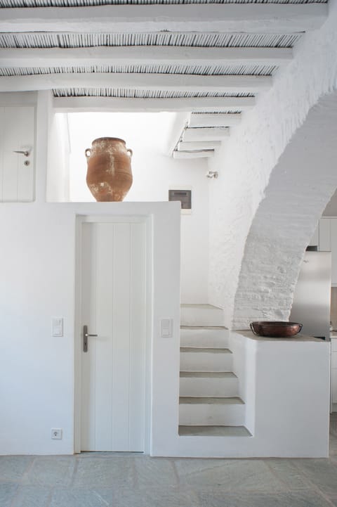 The bathroom on the ground floor and the staircase leading to the first floor