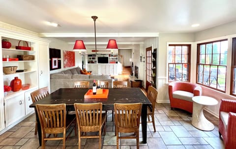 KITCHEN/GREAT ROOM: table seats 12 with leaves, SMART TV, bluetooth speakers