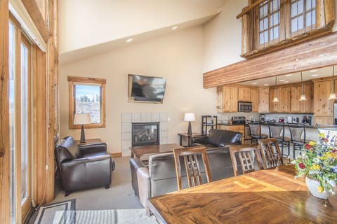 Living Area - Natural light flows in with the large windows.