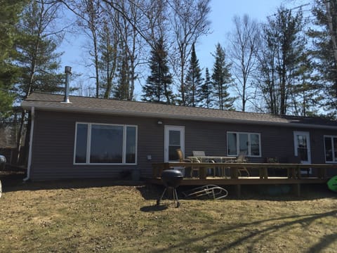 Half shot of the front of the lake house.