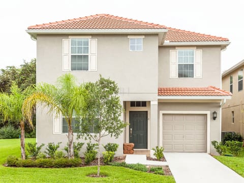 Our beautiful home is in great condition with a small garden in front.