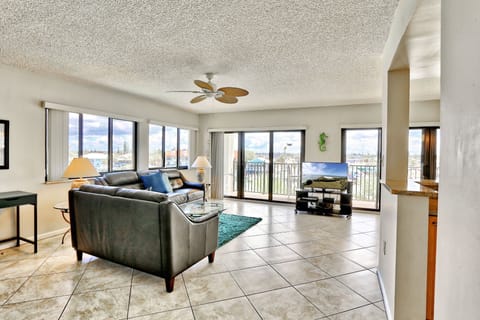 Open Living area opening up to large waterfront balcony