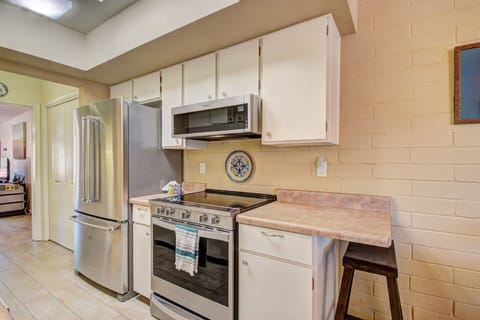Kitchen with stainless appliances.