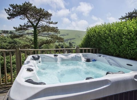 Enjoy the views whilst relaxing in the 8 person hot tub on the terrace