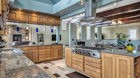 Kitchen opens to dining and living rooms