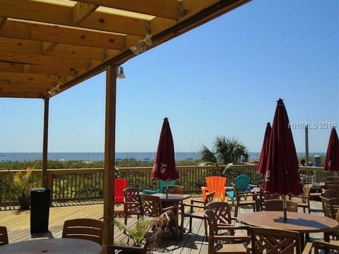 View from the poolside restaurant with attached bar and shaved ice stand.