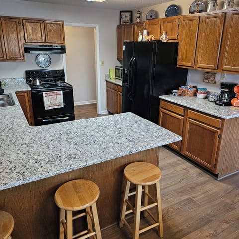 kitchen with bar seating for 3
