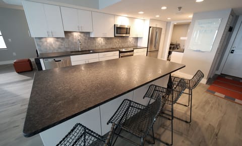 Large granite island and fully furnished kitchen