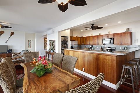 FULLY EQUIPPED KITCHEN WITH BAR TOP SPACE