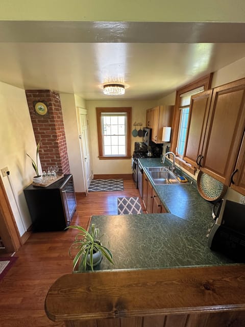 kitchen; gas range-microwave-dishwasher- toaster oven- compact fridge