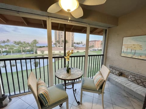 Enjoy watching the sun rise and golfers from your screened patio.