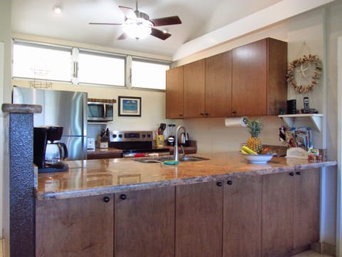 Granite counter and stainless appliances