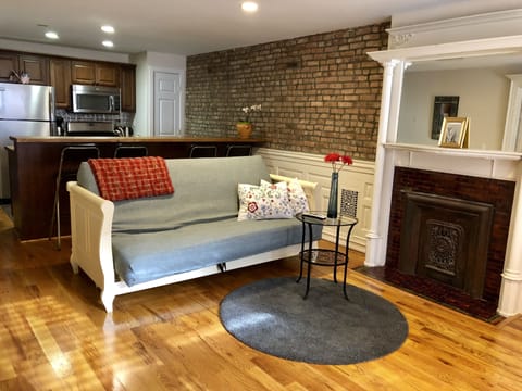 Living room and kitchen behind