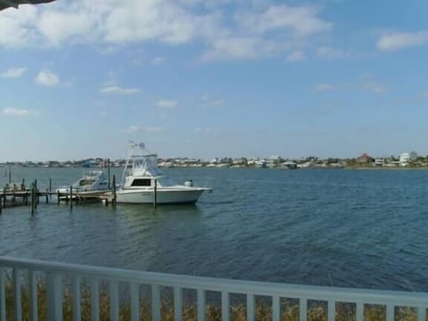 Photo off of back deck of pier and boat docks
