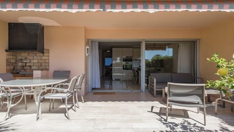 large protected terrace with bbq