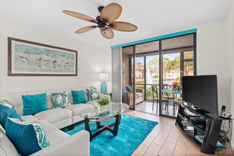 Modern updated Family Room showing AIR CONDITIONED  lanai with lake view