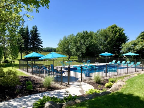 BACKYARD: pool(self-closing fence), hot tub, fire pit, grill, dining seats 24