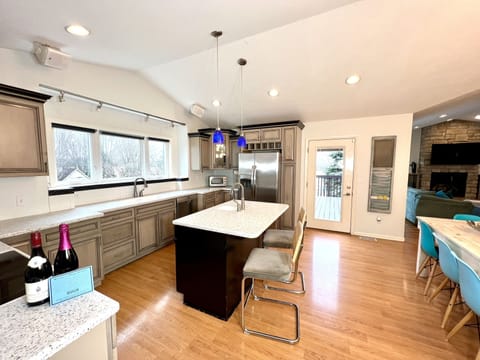 KITCHEN:open to living room, dining room, pantry & outdoor dining deck. Seats 12