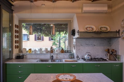 The roomy gourmet kitchen invites experimentation and multiple cooks!