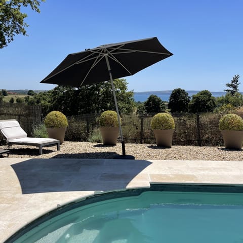 Pool with view, sunbeds, pergola, umbrellas