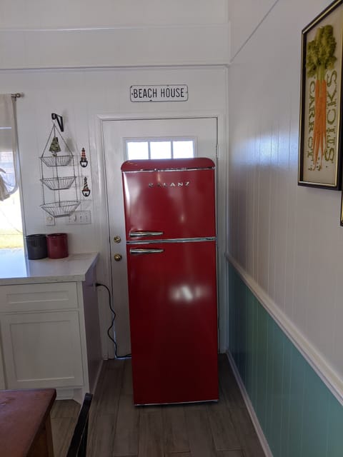 Artsy red fridge. Roomy. Our accent piece. :)