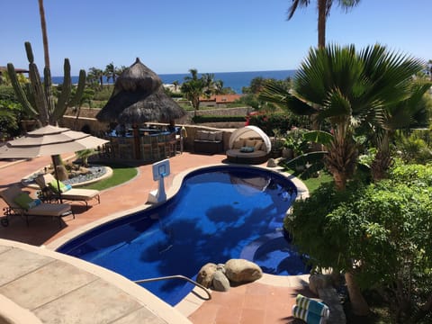 Spacious and beautifully appointed in-ground pool and spa is sunny all day. 