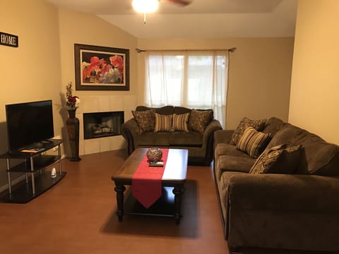 Sit back and enjoy a movie and popcorn in this relaxing and cozy living space.