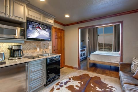 Westgate 3901B: Kitchenette and primary bedroom with King bed