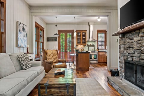 Bright and inviting, the open living, dining, and kitchen areas on the main level encourage rest & relaxation.