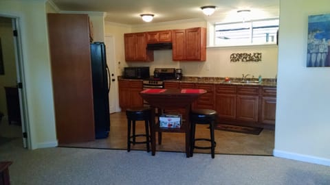 Roomy kitchen with eating area.
