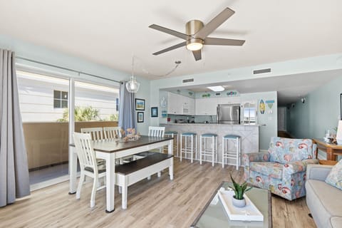 Dining Area - Extra balcony space with the Gulf front patio wrapping around the building to provide more views.