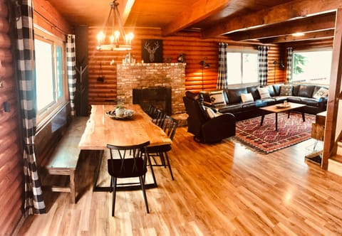 Dining nook for 8 for family meals and huge leather sofa for movie night