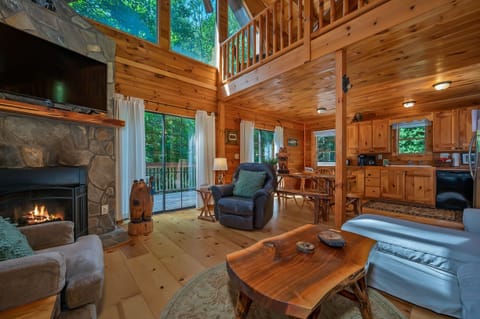 Large 3 story log home. Open living room.