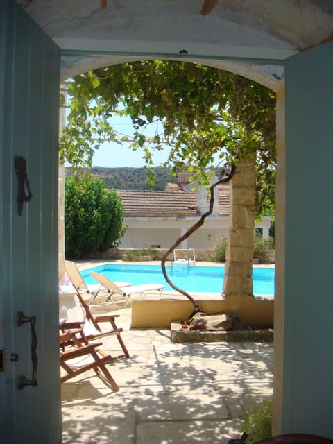 View from inside on the terrace and pool