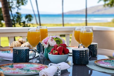 Breakfast on the upper Lanai with Ocean and property views