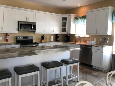 Comfortable seating for 4 at the kitchen island.