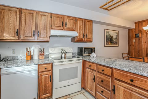 Large kitchen with new appliances and granite countertops