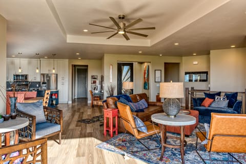 Living Room Furniture - The living room is designed as an open floor plan and is a great gathering place for meals, games, or watching TV during your stay.