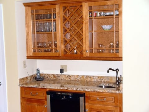 Bar with wine cooler.