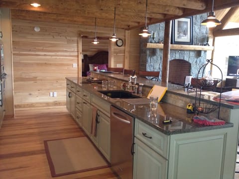 Kitchen with stove top, oven, microwave, dishwasher and garbage disposal