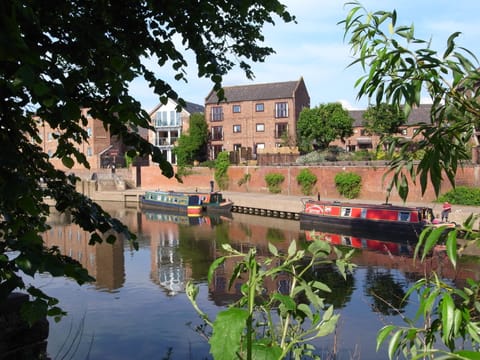 Narrow Boats moored up at the Lock gates below the apartment.