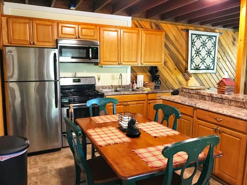 The kitchen has all your necessary appliances, cookware, tableware and utensils