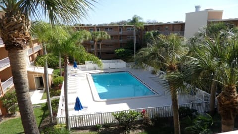 Condo swimming pool view outside the entry door. 