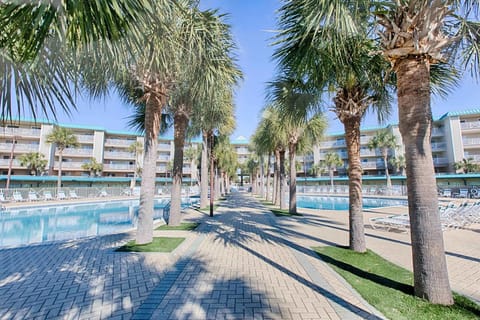 Walkway between the two pools. Pool on left is HEATED